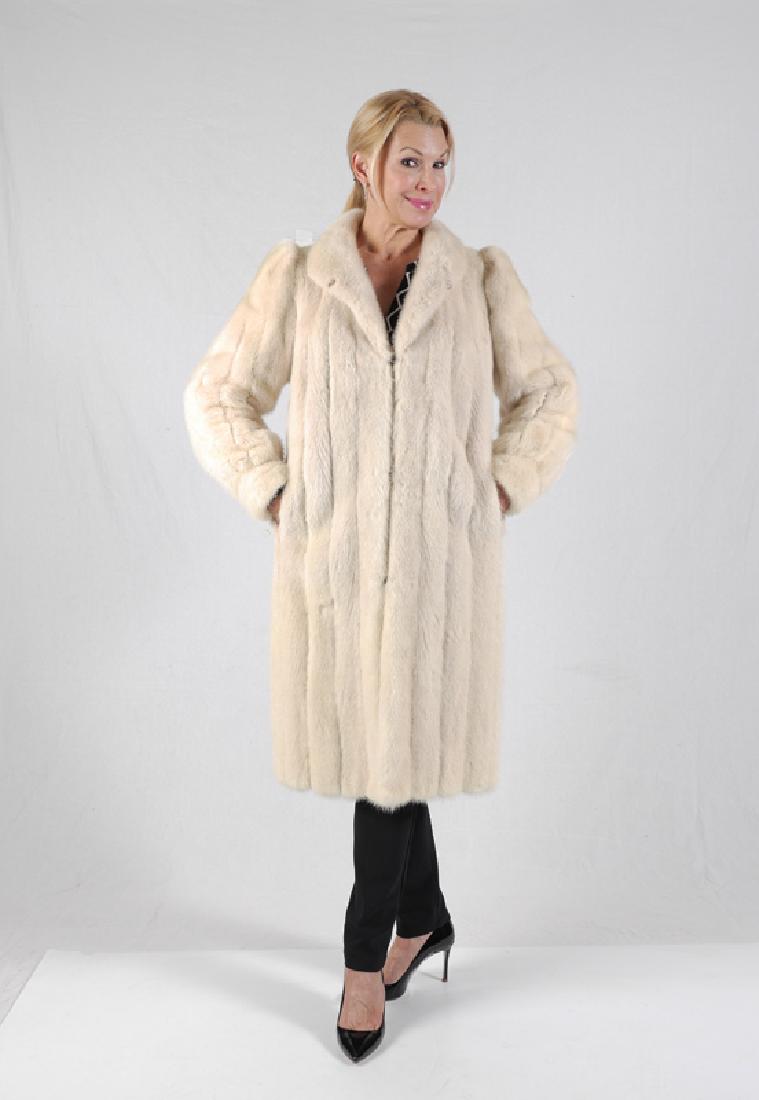 CUSTOM MADE FULL-LENGTH WHITE MINK: CUSTOM MADE FULL-LENGTH WHITE MINK: Ranch mink coat has a new lining and interior pockets. Cleaned and glazed and kept in cold storage. Approximate measurements: 29'' from neck to sleeve cuff/hem, 15'