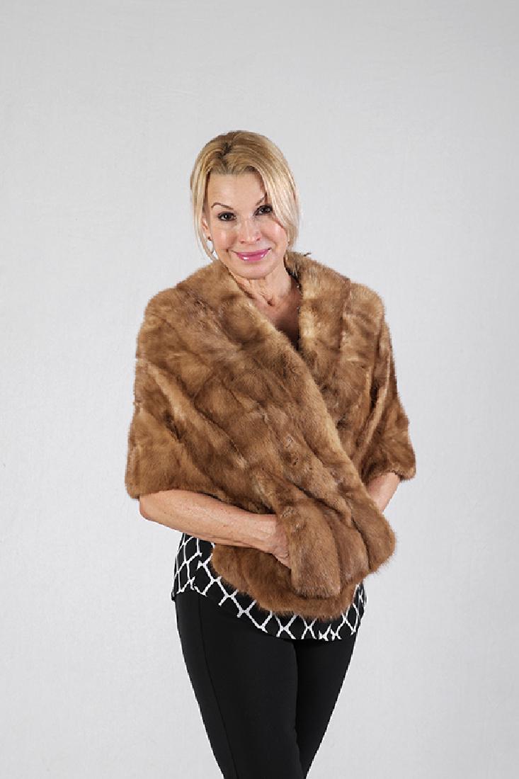 BLUSH MINK STOLE: BLUSH MINK STOLE: Silk lined with pockets on both sides and Weiners Fur label. Fur consumer protection label in pocket. Kept in professional cold storage.