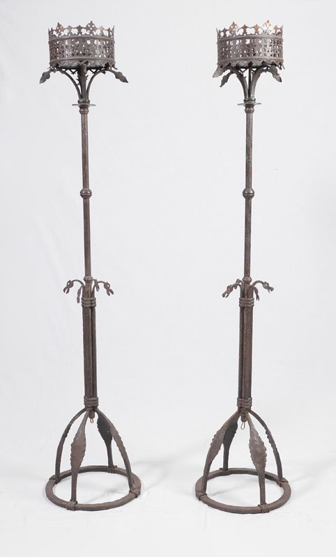 PAIR WROUGHT IRON & BRONZE FLOOR TORCHIERES: PAIR WROUGHT IRON & BRONZE FLOOR TORCHIERES: Gothic Revival style mixed metal, pierced cast bronze top gallery, cast iron body and round base with foliate and dragon heads accents. Electrified, overal
