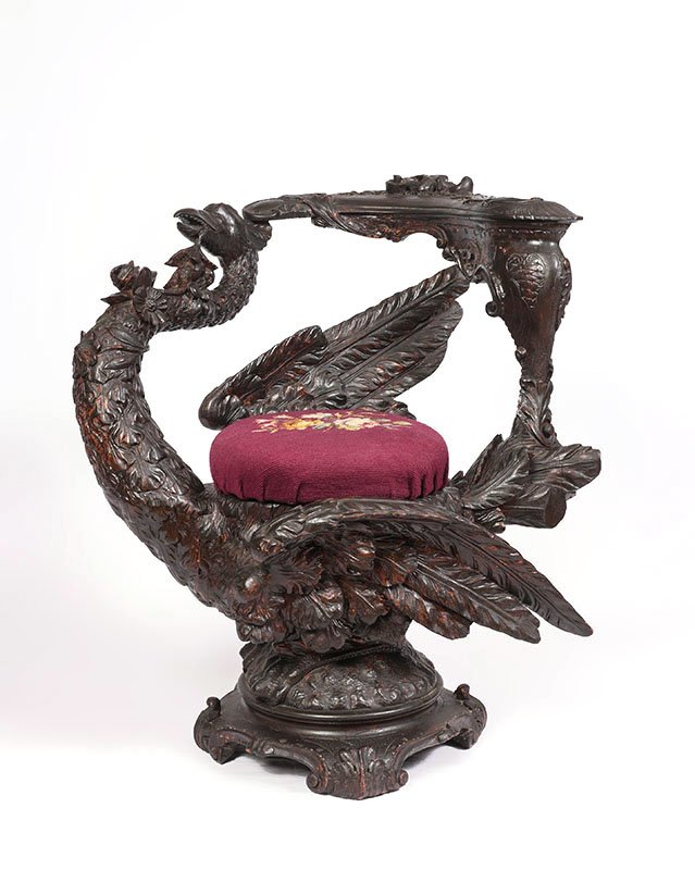 PAULY & CIE ITALIAN CARVED FIGURAL PHOENIX CHAIR: PAULY & CIE ITALIAN CARVED FIGURAL PHOENIX CHAIR: Finely detailed ebonized carved wood with full figure carved phoenix bird with its back as the seat, neck and head comprising half of the back. Rococo