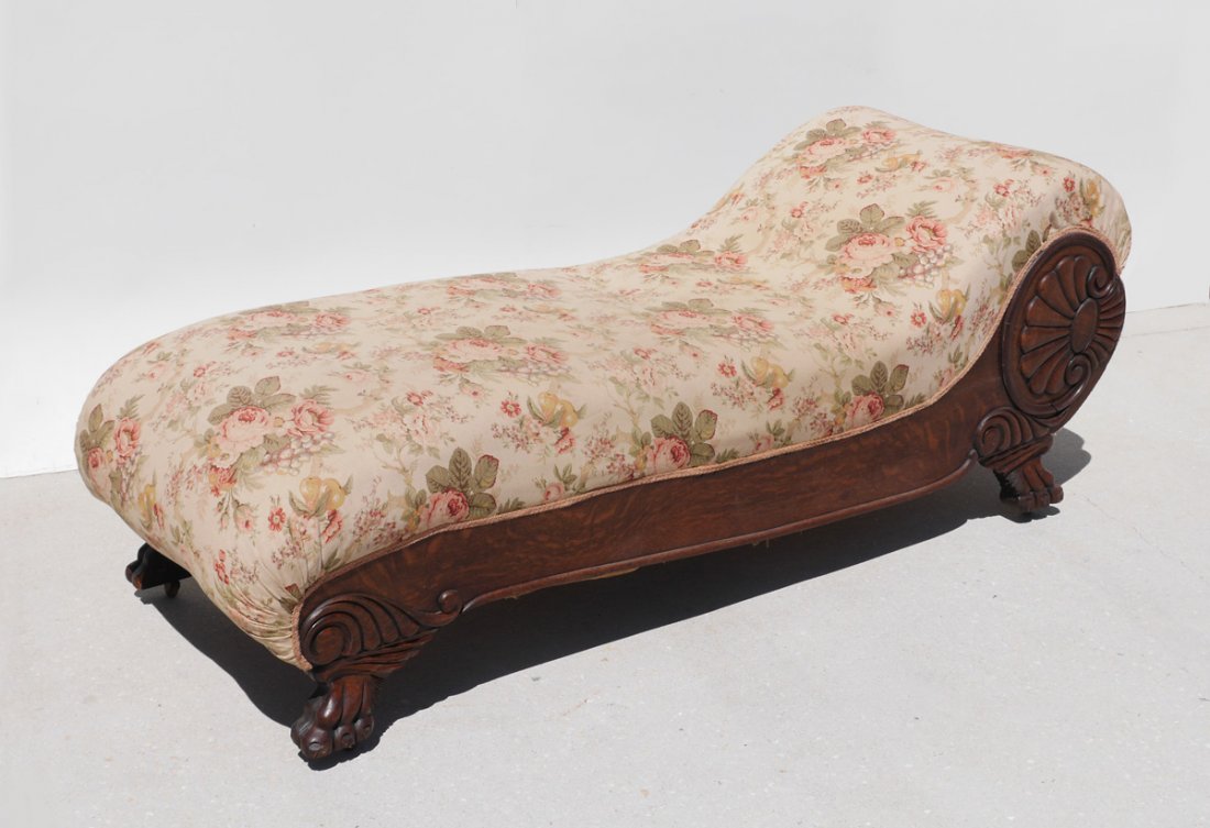 VICTORIAN CARVED OAK FAINTING COUCH: VICTORIAN CARVED OAK FAINTING COUCH: Carved shell in medallion and paw feet on castors, floral upholstery, 29 1/2" h. x 74" x 27 1/2".