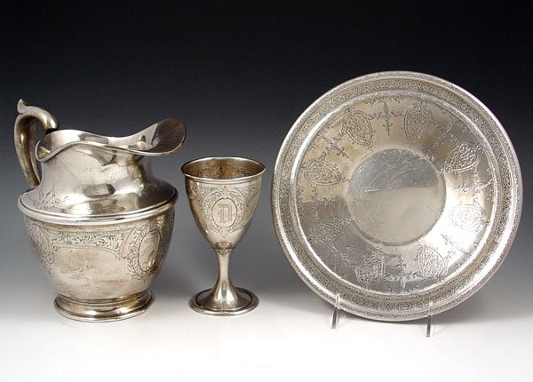 BALTIMORE WEIDLICH STERLING PITCHER PLATE CHALICE: BALTIMORE & WEIDLICH STERLING PITCHER, PLATE & CHALICE: To include 1) Weidlich Sterling plate with engraved design. Measures 10 1/8" dia. 2) Baltimore Silversmiths sterling pitcher with engraved desig