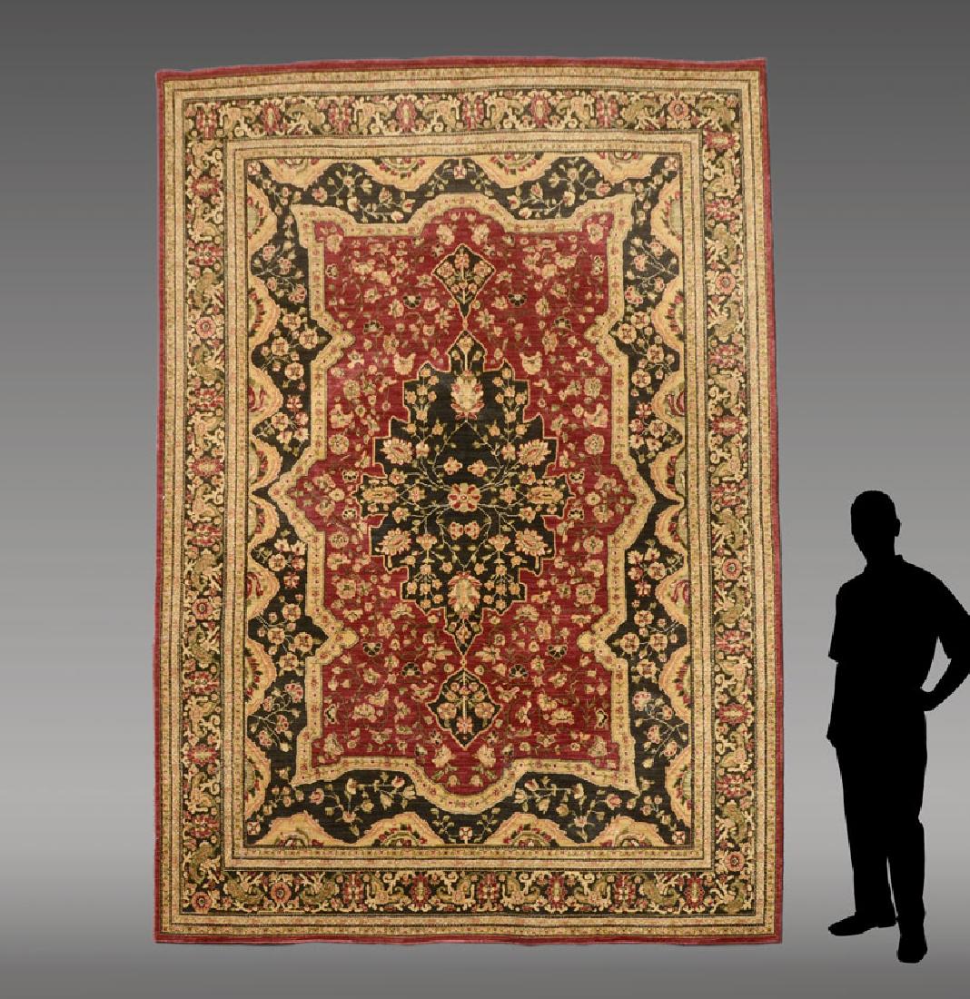 MM PERSIAN-PATTERNED TOMMY BAHAMA RUG 7'8'' X 10'9'': APPROX 15-25 YEARS OLD MACHINE MADE RUG WITH PERSIAN PATTERN, MADE BY TOMMY BAHAMA 7'8'' X 10'9'': This rug has a black colored central medallion and a scalloped black inner border around a red ground