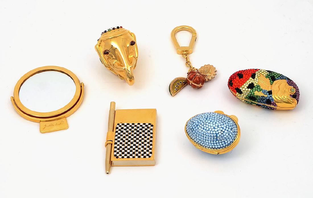 6 PIECES OF JUDITH LEIBER ITEMS: 6 PIECES OF JUDITH LEIBER ITEMS: 1) Crystal and gold tone glam notepad & pen; 2) Colorful crystal fish pill box; 3) Colorful elephant pill box; 4) Gold tone purse mirror, 2.15''; 5) Sky blue crystal e