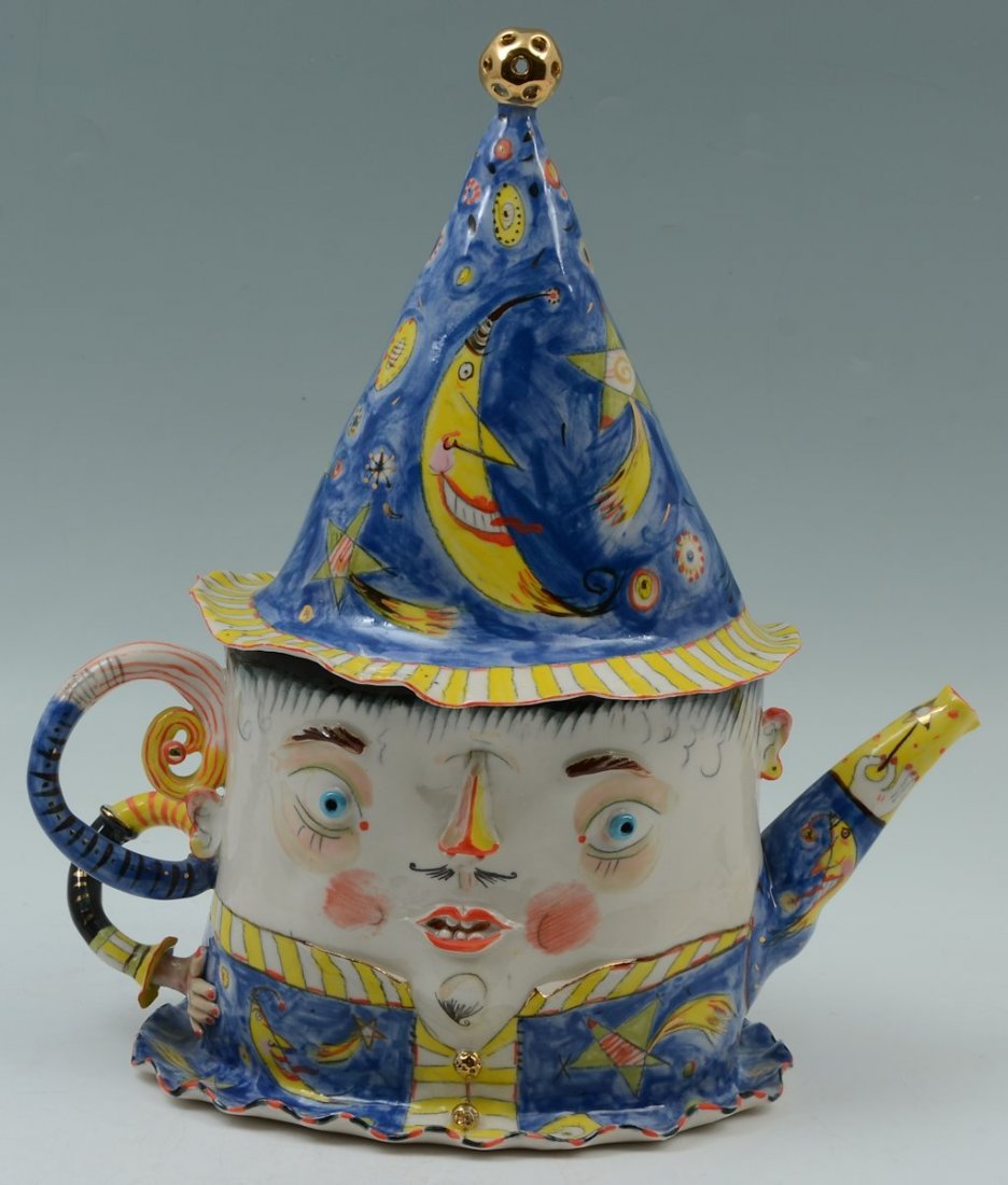 IRINA ZAYTCEVA WHIMSICAL PORCELAIN FIGURAL TEAPOT: IRINA ZAYTCEVA WHIMSICAL PORCELAIN FIGURAL TEAPOT: Part of a 4 part sea set, this represents the father, figural bust of a man with scroll arm handle, polychrome decoration. Signed on back, overall 14