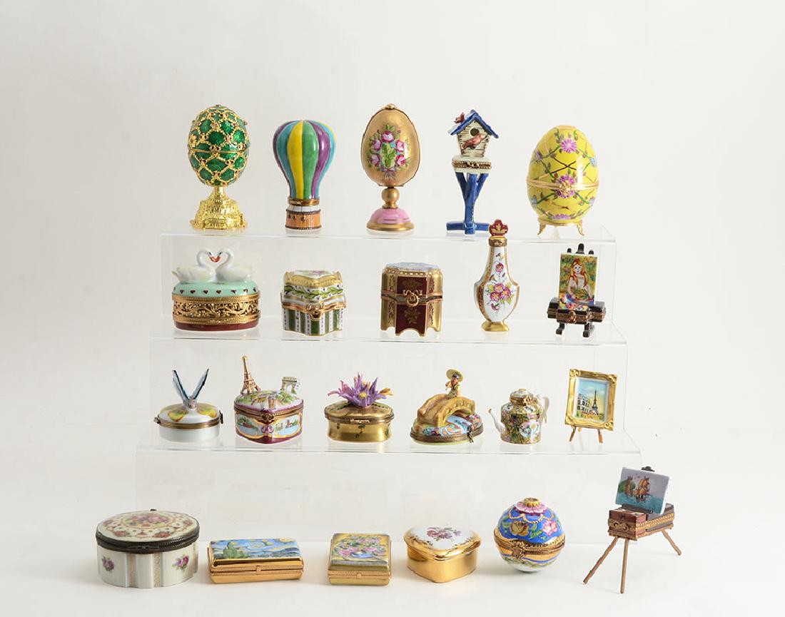 ESTATE COLLECTION OF 20 LIMOGES TRINKET BOXES: ESTATE COLLECTION OF 20 LIMOGES TRINKET BOXES: An assembled collection of 20 boxes and miniature perfume holders, various makers to include Atelier, Jacques, and more. Shapes to include hot air balloo