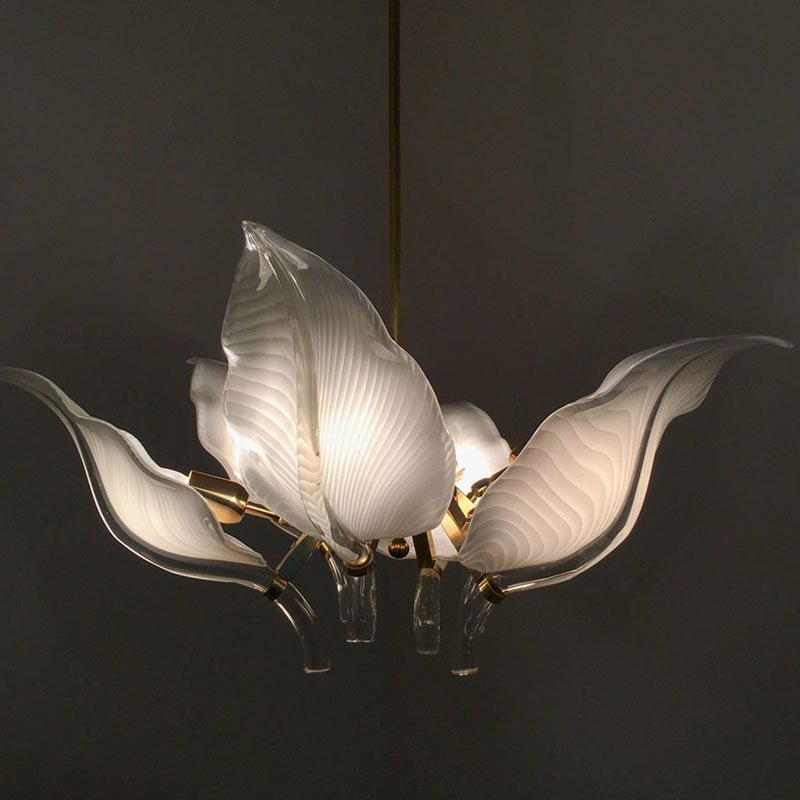 FRANCO LUCE MURANO GLASS LEAF CHANDELIER: FRANCO LUCE MURANO GLASS LEAF CHANDELIER: Brass frame and down rod with 6 lights. Pulled feather white glass leaf form shades with clear glass stems. Overall 75" h. with the 2 downrods x 32" dia.