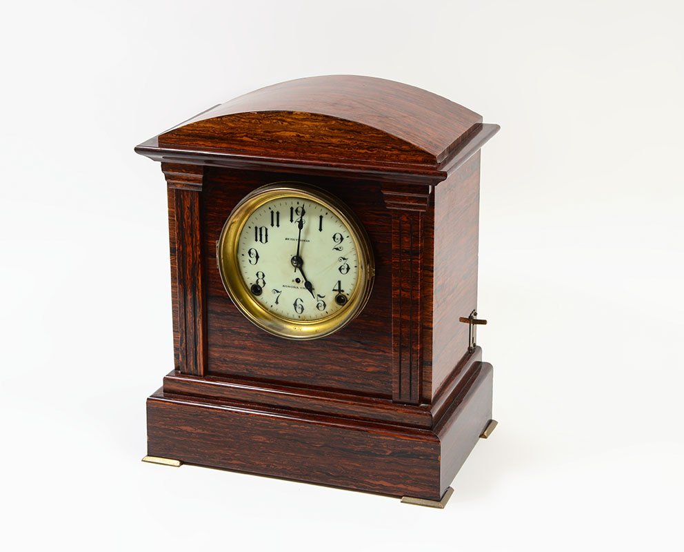 SETH THOMAS SONORA CHIMES MANTLE CLOCK: SETH THOMAS SONORA CHIMES MANTLE CLOCK: Architectural case with adamantine finish, porcelain dial with Arabic numerals, marked on front, 8 day time and strike movement, chime and silent lever on side,