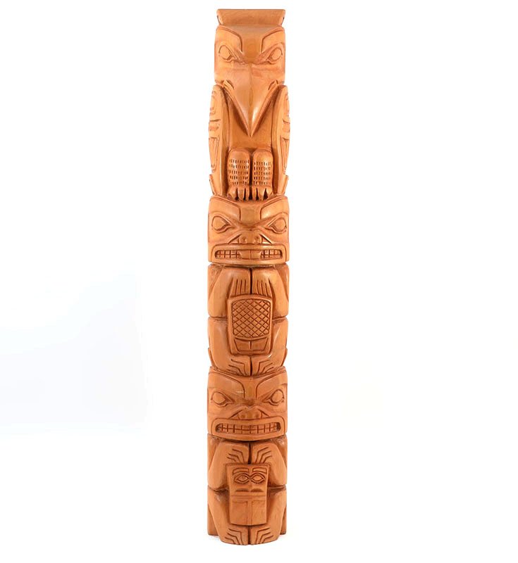 J. MICHAEL CARVED NORTHWEST CEDAR TOTEM: J. MICHAEL CARVED NORTHWEST CEDAR TOTEM: Carved figure of an eagle over beaver over human signed on base J. Michael @ NWA and dated '94. measures 36" h. x 5 3/4" x 4 1/2".