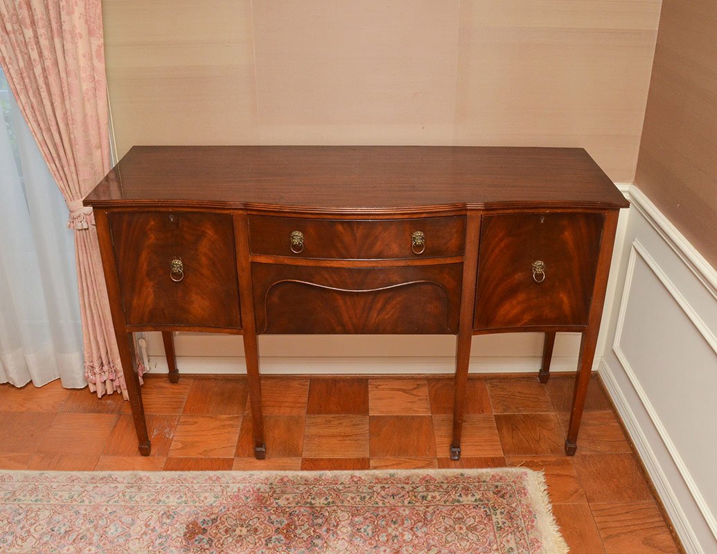 BERESFORD & HICKS HEPPLEWHITE STYLE MAHOGANY SERVER: BERESFORD & HICKS HEPPLEWHITE STYLE MAHOGANY SERVER: Shaped top, center bowfront with 2 drawers, flanked on either side by a single door, tapered legs, 37" h. x 60" x 21 1/4".