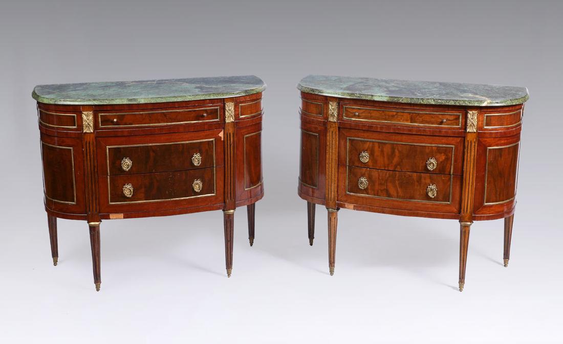 PAIR MAHOGANY MARBLE TOP COMMODES: PAIR MAHOGANY MARBLE TOP COMMODES: Matched mahogany veneer commodes, variegated green marble tops, 3 center drawers, fluted stiles, gold decorated metal accents, fluted tapered legs. Overall 32 1/4'' 