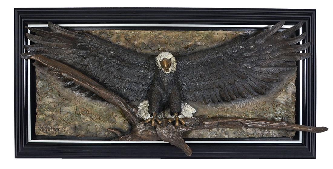 LARGE BILL MACK BALD EAGLE SCULPTURE: MACK, Bill, (American, b.1949): Bald Eagle Bonded and Painted Sand Sculpture, 27" x 69" x 14" deep, signed lower left, custom frame, 40" x 79".