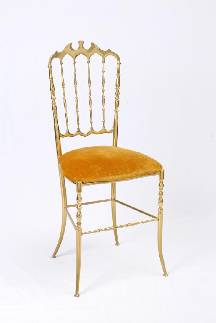 ITALIAN BRASS CHIAVARI SIDE CHAIR: ITALIAN BRASS CHIAVARI SIDE CHAIR: 20th century cast brass frame, shaped top rail, spindle back, gold upholstered seat, 35 1/4'' h. x 15 3/4'' x 16''.
