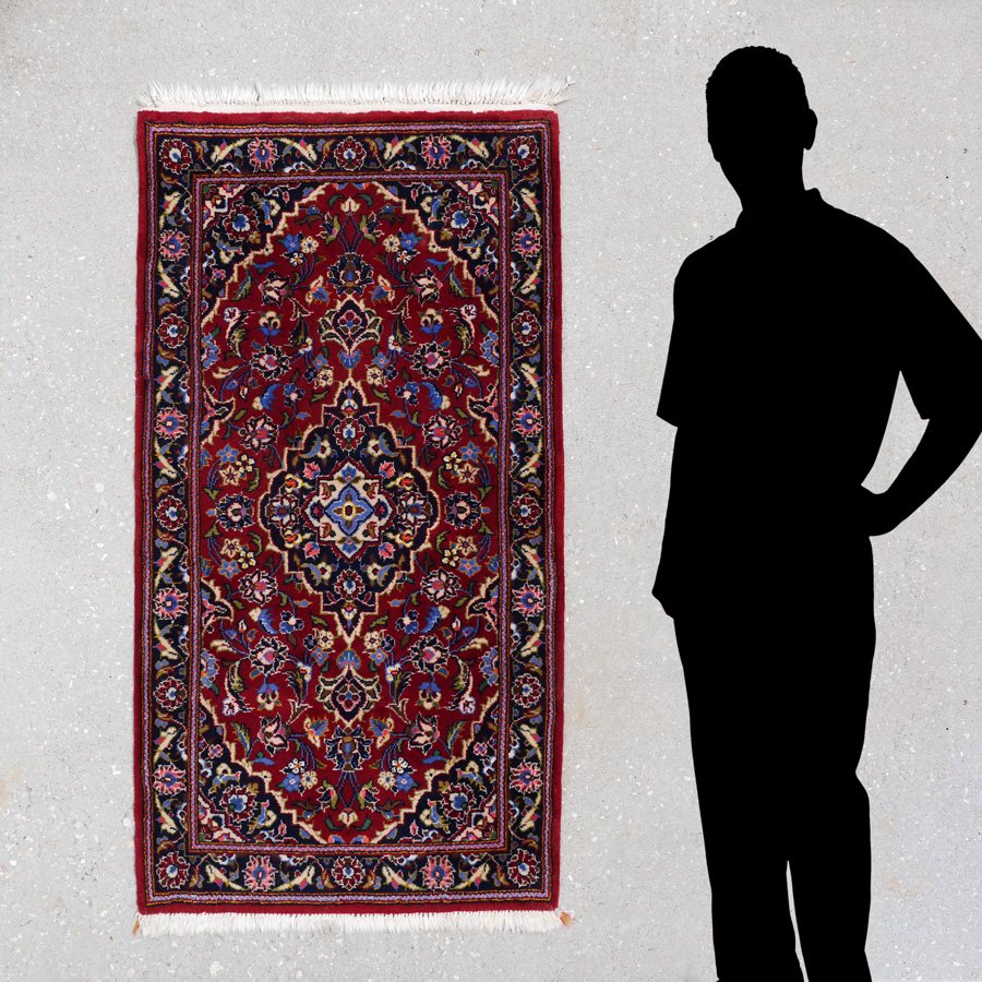 INDO-PERSIAN HK WOOL RUG, 2'4" X 4'3": APPROX 20-40 YR OLD INDO-PERSIAN HAND KNOTTED WOOL RUG, 2'4" X 4'3": This rug has crisp and clear colors with its brick red field, its central medallion in dark & light blue, and white with spandrels