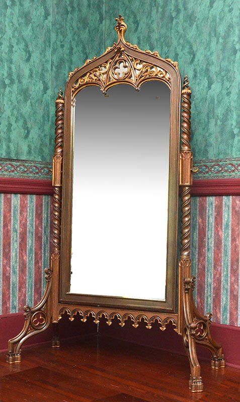 AMERICAN GOTHIC REVIVAL CHEVAL MIRROR: AMERICAN GOTHIC REVIVAL CHEVAL MIRROR: Carved and shaped crest over applied openwork decoration, carved twist column supports, valanced lower trim, 4 openwork splayed legs.