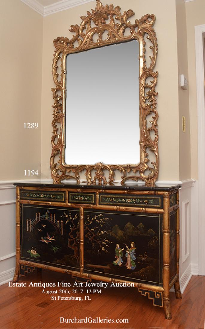 ROCOCO STYLE GOLD DECORATED WALL MIRROR: ROCOCO STYLE GOLD DECORATED WALL MIRROR: Open work composite frame with antiques gold decorated foliate scroll and flower blossom designs. 62 1/2'' h. x 38 1/2'' x 1 1/2''.