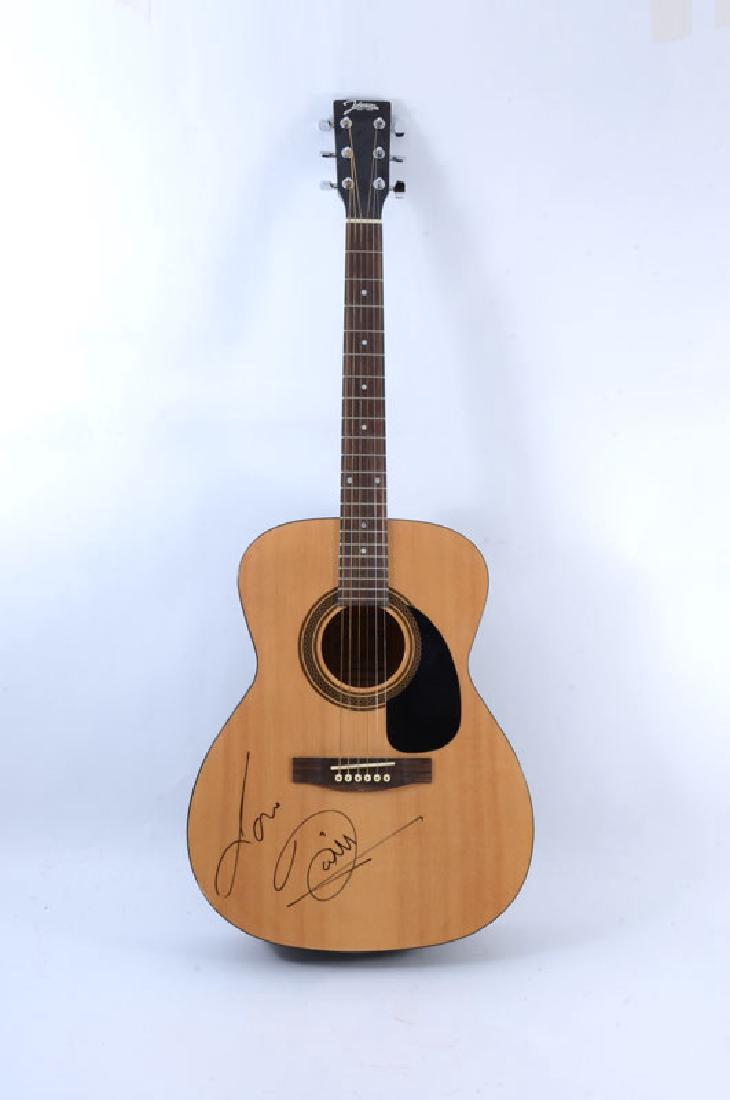 BARRY GIBB SIGNED ACOUSTIC GUITAR: BARRY GIBB SIGNED ACOUSTIC GUITAR: Johnson model JG-420-N acoustic guitar signed by Barry Gibb, one of the members of the disco super group The Bee-Gees. Overall measures 39 1/2'' l. x 15 1/2'' x 4''.