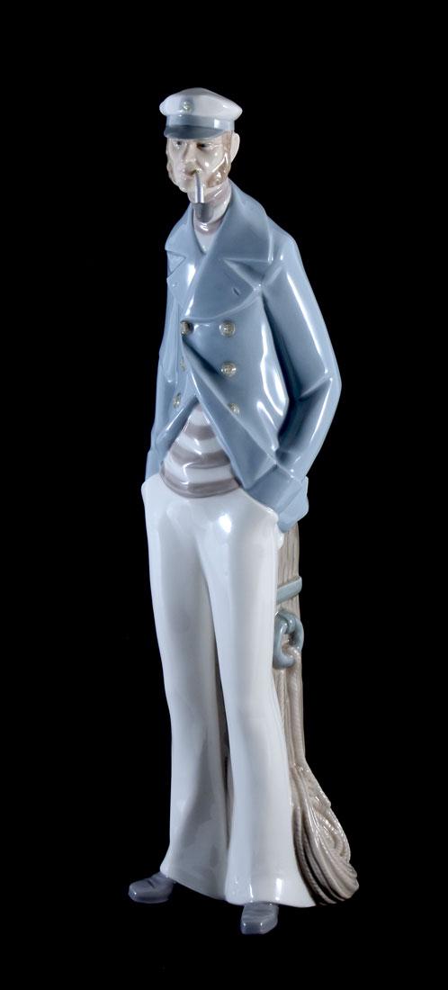 LLADRO SEA CAPTAIN 4621 PORCELAIN FIGURINE: LLADRO SEA CAPTAIN 4621 PORCELAIN FIGURINE: Figure of a sea captain with pipe, #4621, Spanish name Lobo de Mar, issued 1969, retired 1993, 14 1/2'' h., no box.