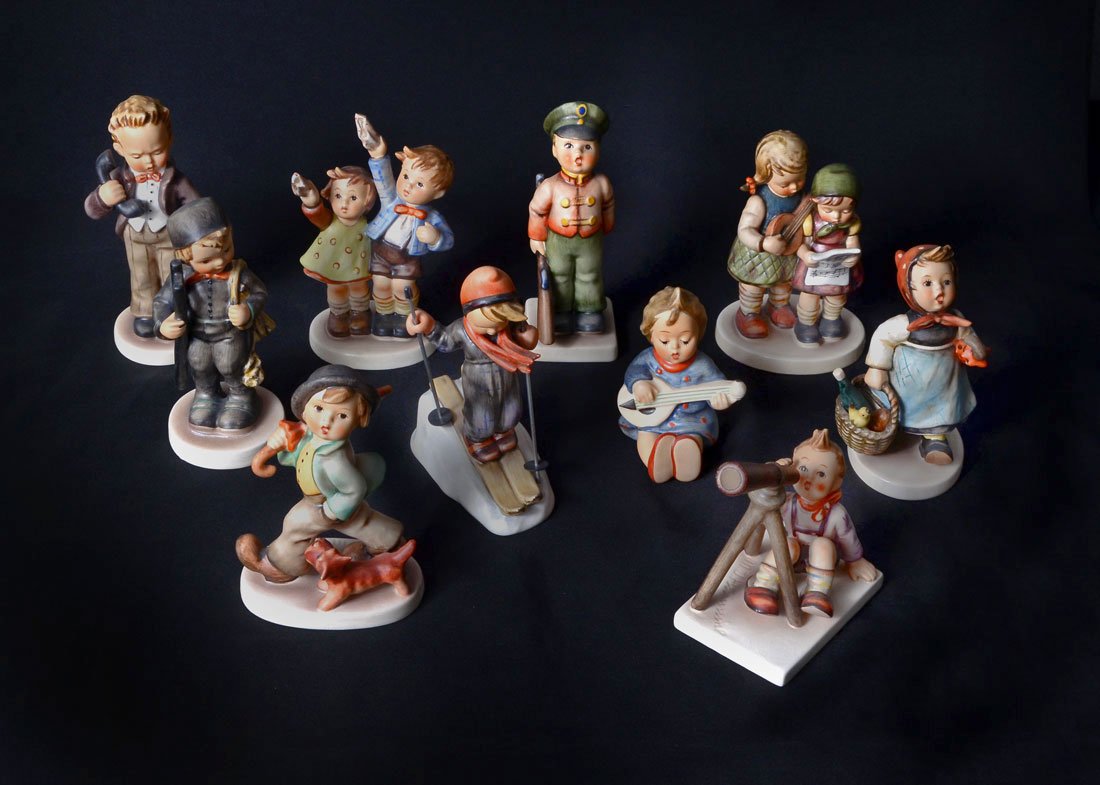 COLLECTION OF 10 GOEBEL HUMMEL FIGURINES: COLLECTION OF 10 GOEBEL HUMMEL FIGURINES: An assembled collection of 10 Hummel figurines, assorted figures and marks. No boxes. Tallest measures 6'' h.