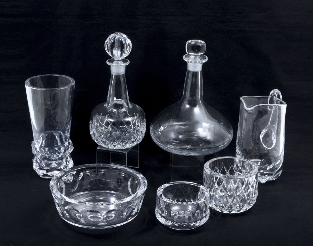 7 PIECE COLLECTION OF ORREFORS CRYSTAL: 7 PIECE COLLECTION OF ORREFORS CRYSTAL: An assembled collection of 7 pieces total, each marked Orrefors, to include 1) Water pitcher, 8 1/4" h. 2) Ships decanter with stopper, 10 1/4" h. 3) cut decant