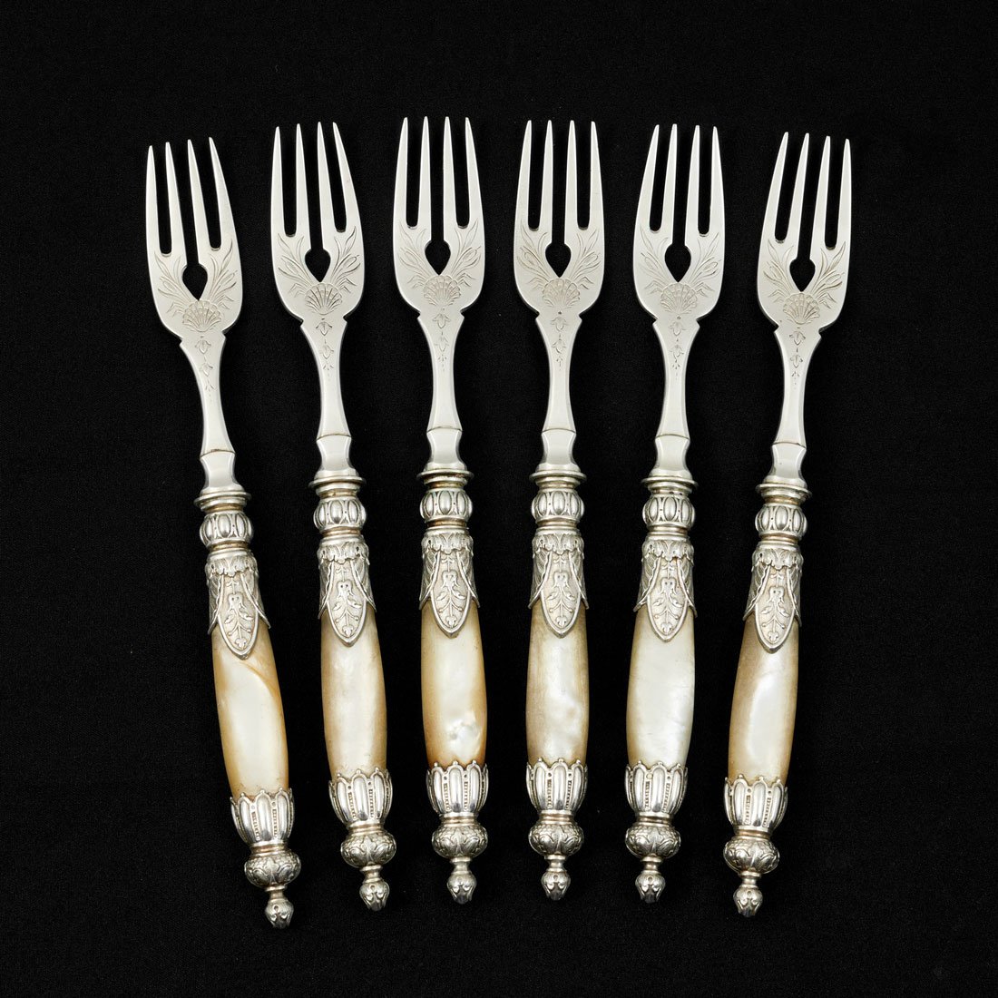 6 KOCH & BERGFELD 800 SILVER FORKS: 6 KOCH & BERGFELD 800 SILVER FORKS: 6 pieces total by German maker Koch & Bergfeld with faux mother of pearl handles, engraved tines, 7 1/2" long.