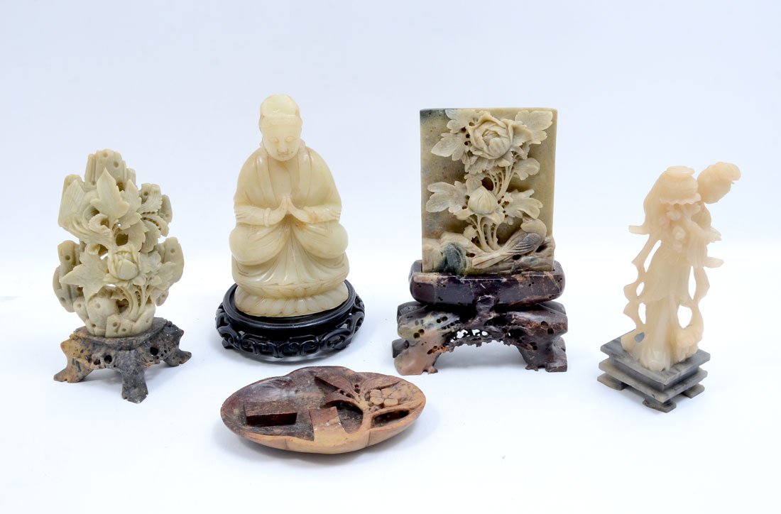 5 PIECE CHINESE STONE CARVINGS: 5 PIECE CHINESE STONE CARVINGS: An assembled collection of 5 pieces total to include 1) Soapstone floral motif table screen and stand, together 8 1/2" h. x 5 1/2" x 2". 2) Soapstone floral spray affix