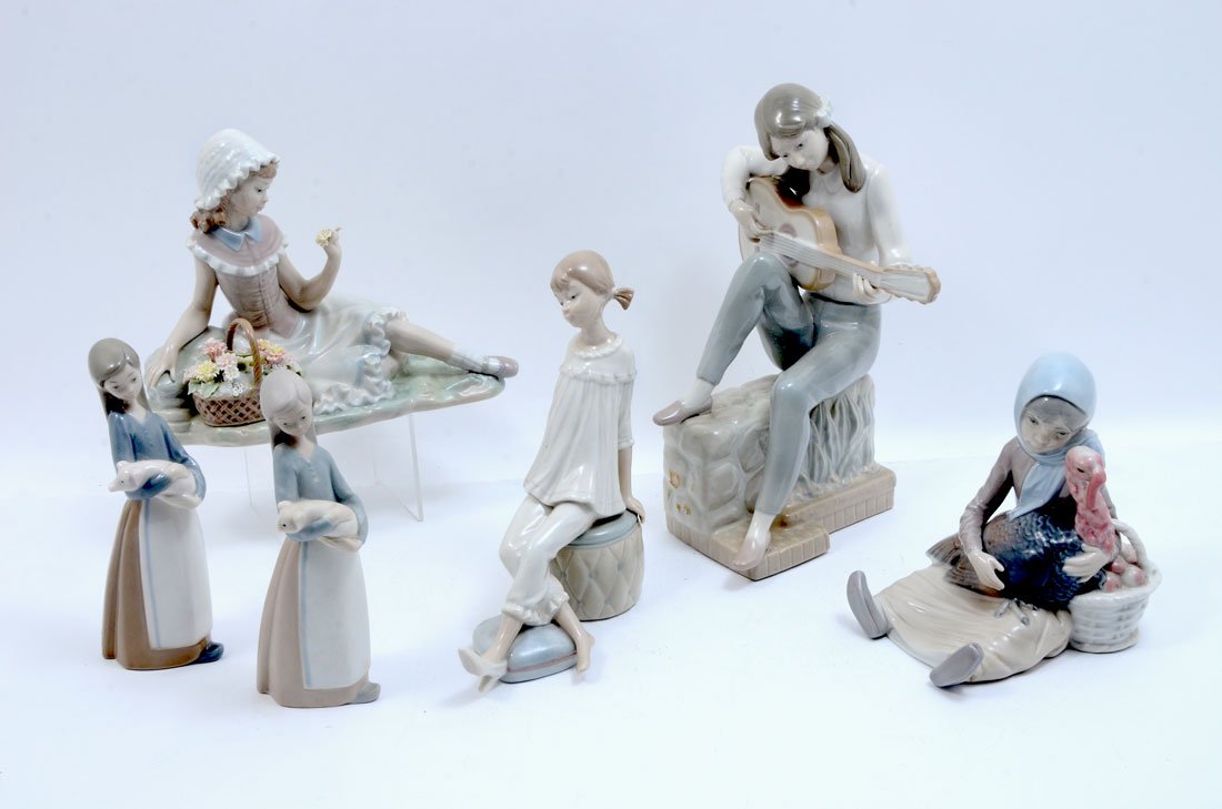 5 LLADRO PORCELAIN FIGURINES & A NAO FIGURINE: 5 LLADRO PORCELAIN FIGURINES & A NAO FIGURINE: 6 pieces total, the 5 Lladros to include 1) Girl with Turkey, retired 1981, 5 3/4" h. 2) Admiration, retired 1985, 6 3/4" h. x 8 1/2". 3) Girl with pig g
