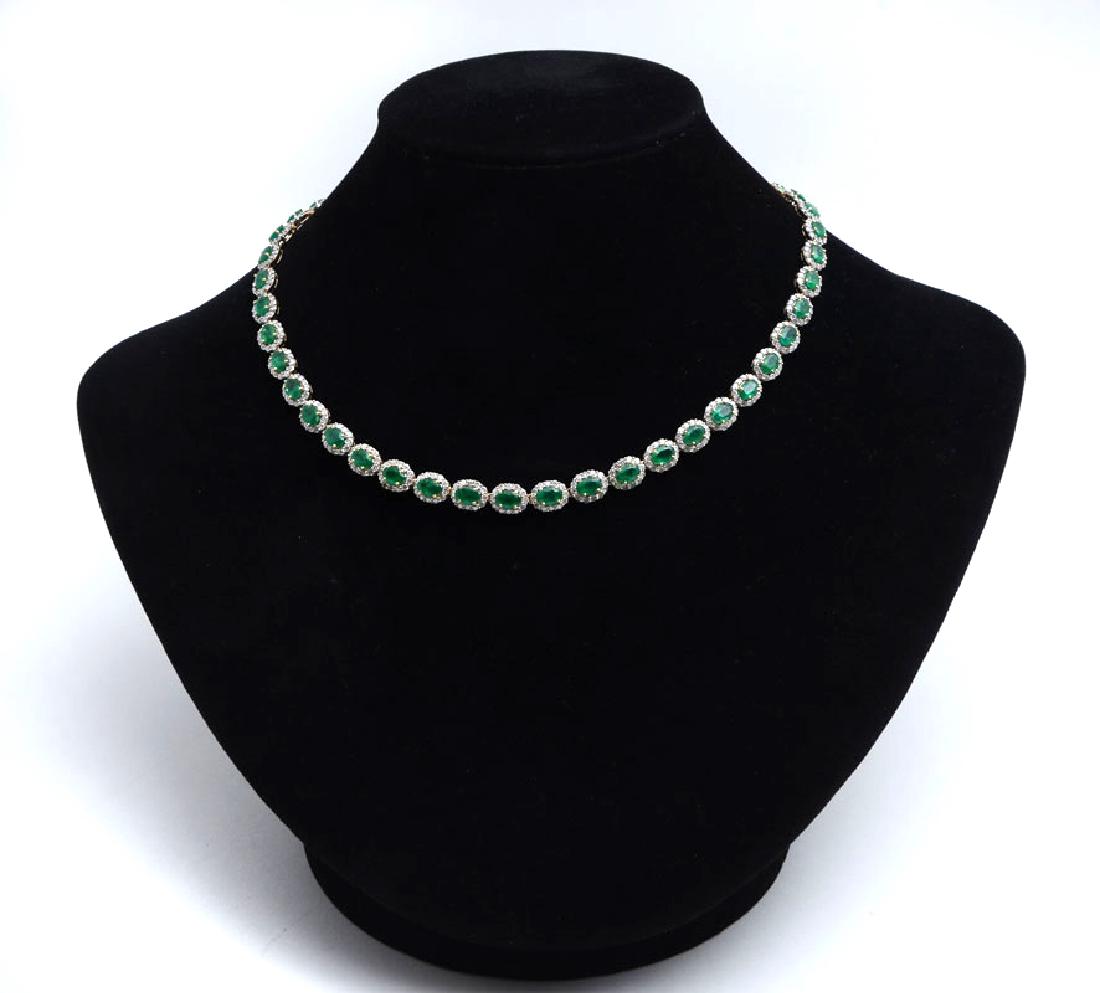 29.19CTW EMERALD & DIAMOND NECKLACE IN 14K: 29.19CTW EMERALD & DIAMOND NECKLACE IN 14K: 45 oval mixed cut emeralds are set in 14K yellow gold and encircled with 540 round full cut diamonds in this 17'' necklace. Total emerald weight is 18.54 CT