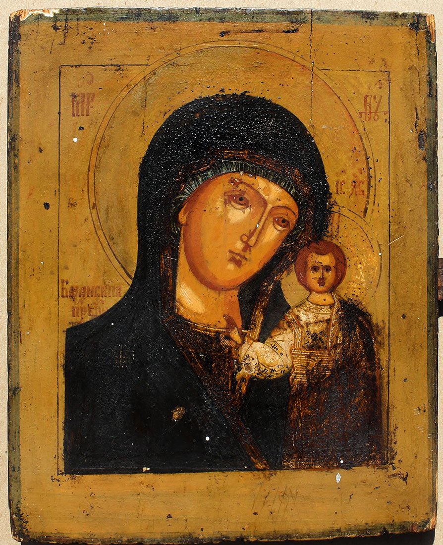 MADONNA AND CHILD ICON PAINTING: MADONNA AND CHILD ICON PAINTING: Oil/Wood panel, 10.50'' x 8.50'', cradled panel, scattered Cyrillic inscriptions.
