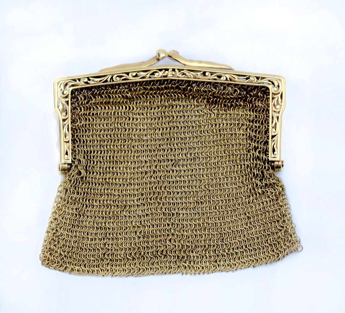 VINTAGE MINIATURE 14K CHAIN MESH PURSE: VINTAGE MINIATURE 14K CHAIN MESH PURSE: Coin purse is 2" x 2" with snap closure frame stamped 14K with decorative pierce work. The chain mesh and the frame are in excellent condition with detailed wor