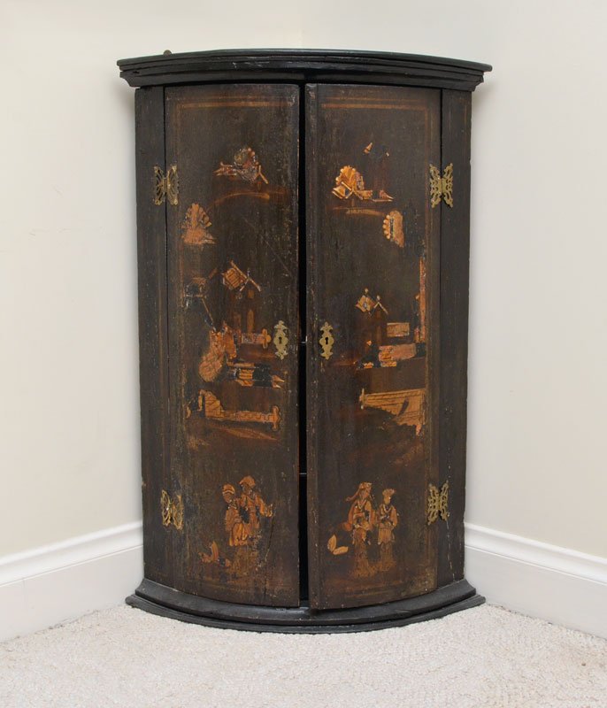 BLACK LACQUER CHINOISERIE BOWFRONT HANGING CABINET: BLACK LACQUER CHINOISERIE BOWFRONT HANGING CABINET: 19th century, molded cornice over 2 bowfront doors with assorted chinoiserie paint decorated genre motifs. Brass hardware, 3 internal shelves, measu