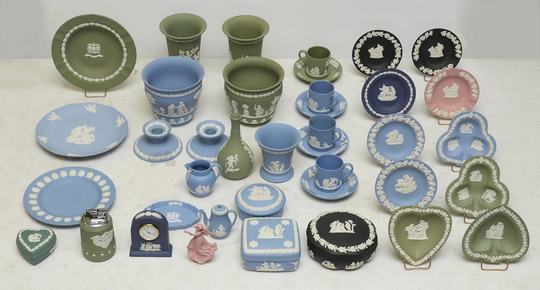 ESTATE COLLECTION OF WEDGWOOD JASPERWARE: ESTATE COLLECTION OF WEDGWOOD JASPERWARE: An assembled collection of approx. 40 pieces, assorted colors and styles. To include candy dishes, plates, vases, clock, lighter, covered box, teacups and mor