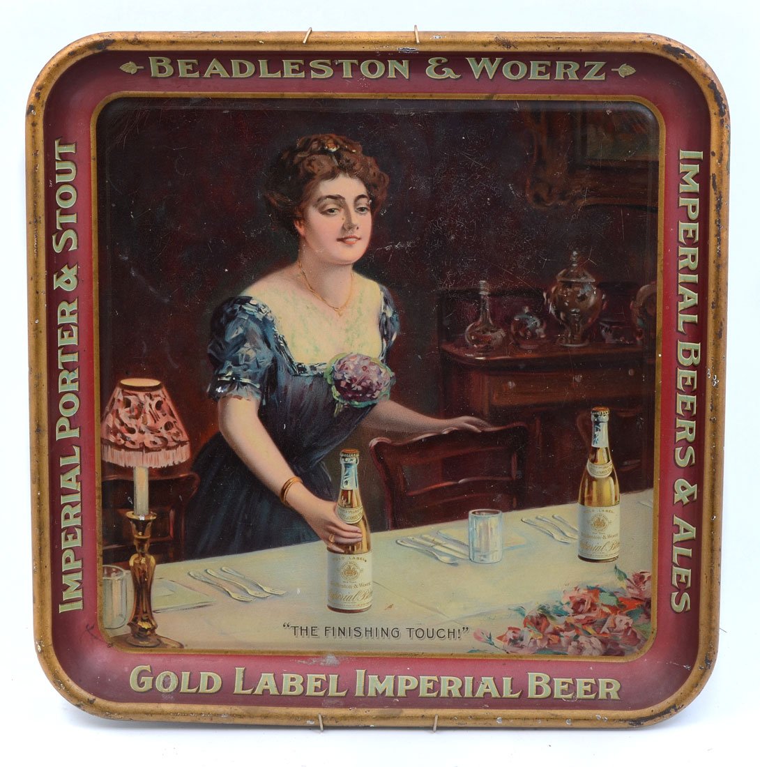 BEADLESTON & WOERZ TIN LITHO ADVERTISING TRAY: BEADLESTON & WOERZ TIN LITHO ADVERTISING TRAY: Tin lithograph image of woman placing beer bottles on table, border with "Beadleston & Woerz, Imperial Beers & Ales, Gold Label Imperial Beer, Imperial P
