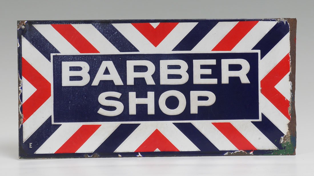 PORCELAIN BARBER SHOP DOUBLE SIDED FLANGE SIGN: PORCELAIN BARBER SHOP DOUBLE SIDED FLANGE SIGN: ''Barber Shop'' either side with red, white and blue stripes, 12'' x 24'' x 2 1/4''.