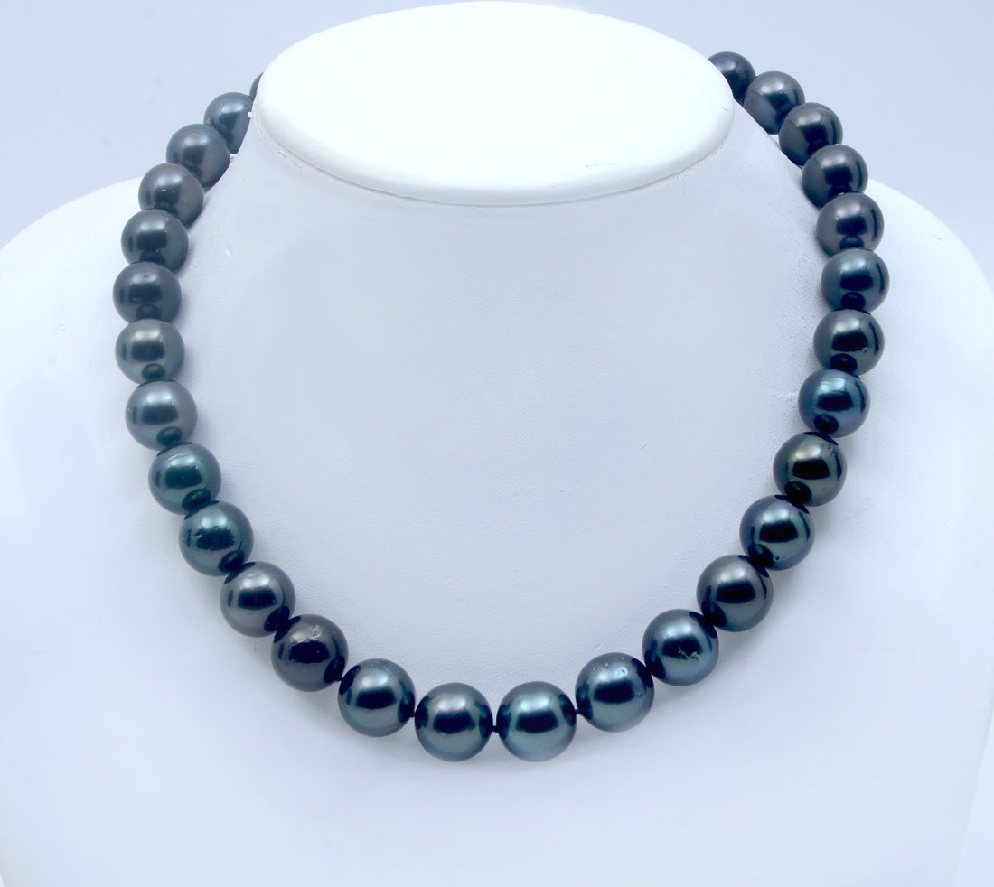 SINGLE STRAND BLACK TAHITIAN PEARLS WITH 14K CLASP: SINGLE STRAND BLACK TAHITIAN PEARLS WITH 14K CLASP: This classic Tahitian 17.5" necklace has 33 graduated pearls that range from 12-14mm. The color ranges from dark gray to black with excellent luster
