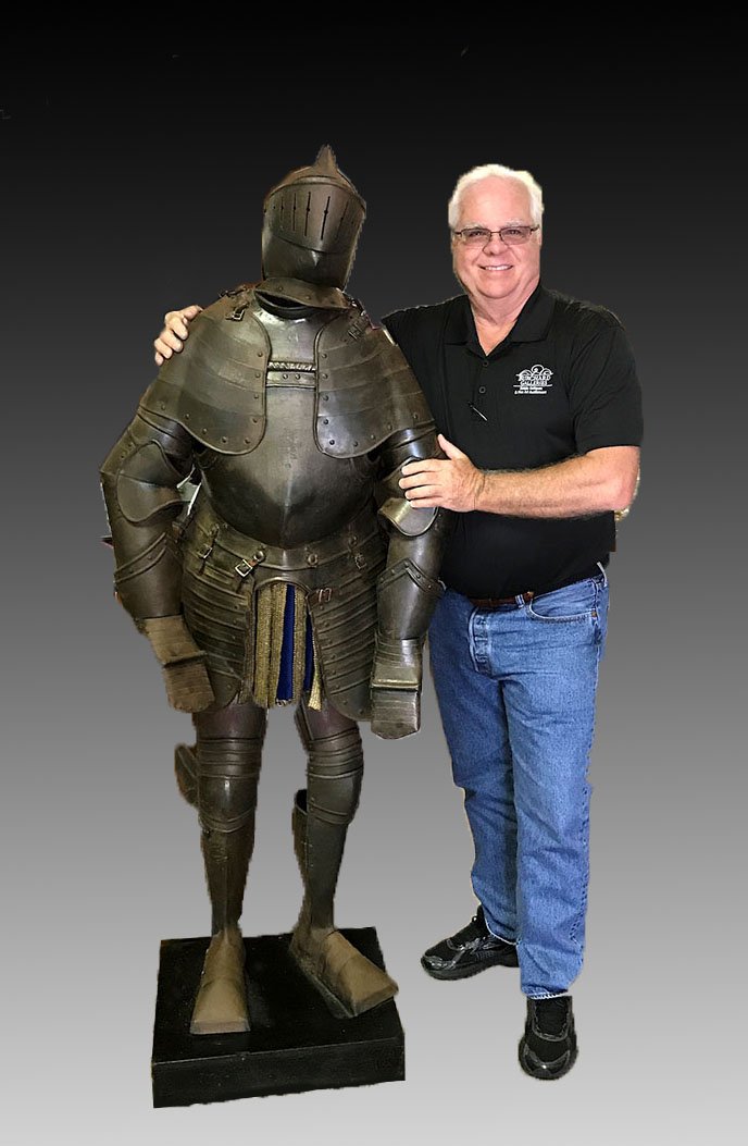 MEDIEVAL STYLE LIFE SIZE SUIT OF ARMOR: MEDIEVAL STYLE LIFE SIZE SUIT OF ARMOR: Victorian era suit of armor mounted on wood base, overall 72" h. x 28" x 16".