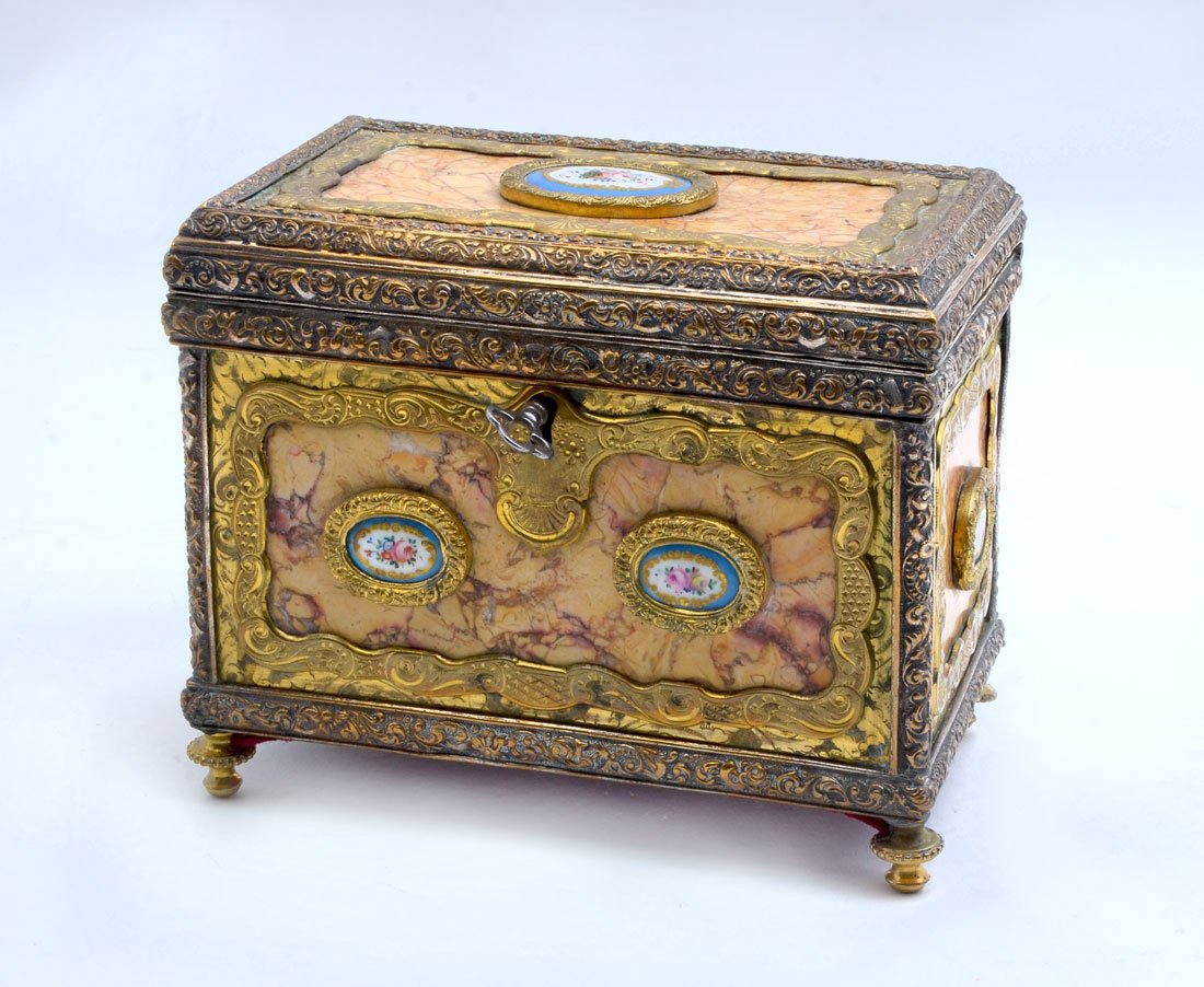 FRENCH ORMOLU, PORCELAIN, AND MARBLE DRESSER BOX: FRENCH ORMOLU, PORCELAIN, AND MARBLE DRESSER BOX: Marble clad locking dresser box or jewelry casket with gilt metal mounts and decoration, floral motif porcelain medallions. Hinged lid, velvet lined i