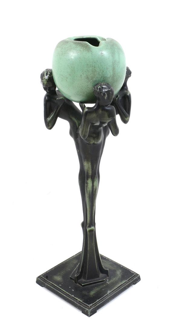 FRANKART ART DECO FIGURAL SMOKING STAND: FRANKART ART DECO FIGURAL SMOKING STAND: Model T335 with 3 patinated cast metal figural nude maidens supporting a mottled green globe form pottery ashtray. Base measures 21 3/4" h. x 7 1/2" x 7 1/2".