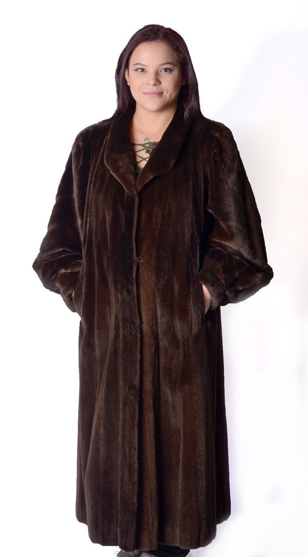 LORD & TAYLOR FULL LENGTH BROWN MINK: LORD & TAYLOR FULL LENGTH BROWN MINK: Lustrous to the touch, this sheared mink has two outer slit pockets and 4 hook and eye closures. Length is 48'' from the shoulder to the hem, 18'' from shoulder t