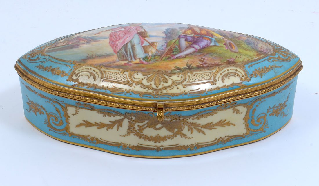 FRENCH PORCELAIN DRESSER BOX SIGNED AUBI: FRENCH PORCELAIN DRESSER BOX SIGNED AUBI: Hinged lid with hand painted outdoor genre scene of figures by a lake, signed Aube lower right. Shaped body, marked France and unknown makers mark. Overall me
