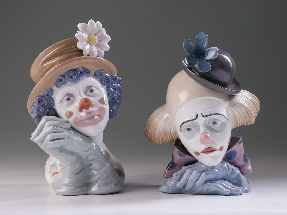 2 LLADRO CLOWN BUST PORCELAIN FIGURINES: 2 LLADRO CLOWN BUST PORCELAIN FIGURINES: 2 pieces total, each from sculptor Jose Puche, glazed finish, to include 1) Pensive Clown (Clown's Head Bowlers Hat), 5130, Spanish name "Cabeza de Payaso", 11