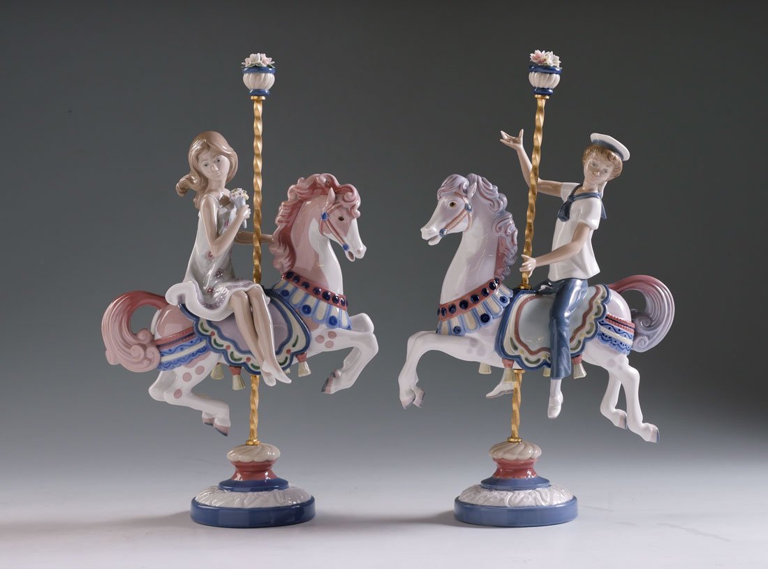 PAIR LLADRO CAROUSEL HORSE PORCELAIN FIGURINES: PAIR LLADRO CAROUSEL HORSE PORCELAIN FIGURINES 2 pieces total, both by sculptor Jose Puche, issued 1985, retired 2000, glazed finish, to include 1) Girl on Carousel Horse, 1469, Spanish name "Nina en 