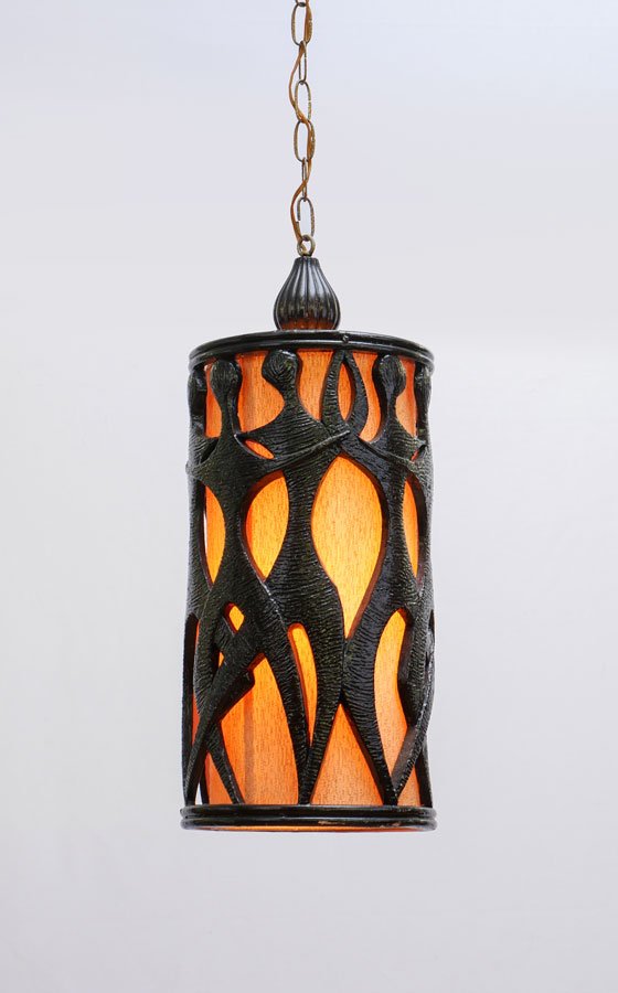 FREDERICK WEINBERG STYLE MID CENTURY HANGING LIGHT: FREDERICK WEINBERG STYLE MID CENTURY HANGING LIGHT: In the manner of Frederick Weingberg, carved wood with dancing figures body, interior cloth shade, single socket fixture, 24'' h. x 10''.