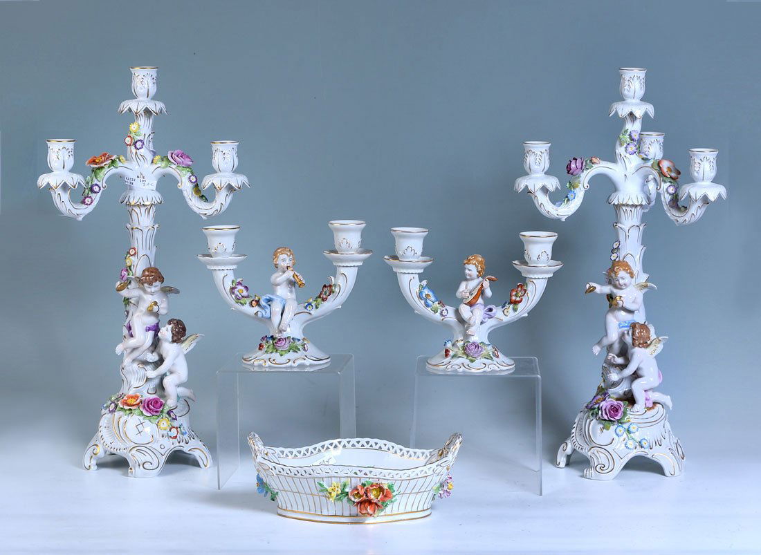 2 PAIRS OF DRESDEN STYLE CANDELABRA AND BASKET: 2 PAIRS OF DRESDEN STYLE CANDELABRA AND BASKET: An assembled collection of 5 pieces total to include 1-2) Matched pair with applied figural cherubs ad flowers, 4 light, no visible marks, 21" h. x 10 1