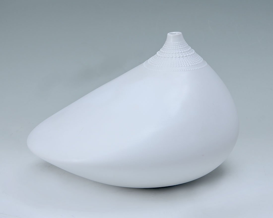 TAPIO WIRKKALA FOR ROSENTHAL POLLO VASE: TAPIO WIRKKALA FOR ROSENTHAL POLLO VASE: "Pollo" vase designed by Tapio Wirkkala for Rosenthal Studio-Line, mid 20th century, marked on base, 7 1/4" h. x 10" x 8 1/4".