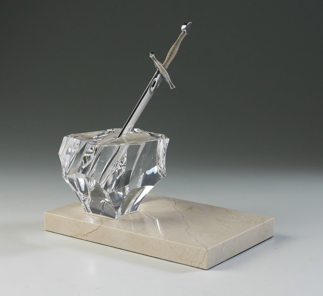 STEUBEN CRYSTAL & STERLING EXCALIBUR LETTER OPENER: STEUBEN CRYSTAL & STERLING EXCALIBUR LETTER OPENER: Designed by James Houston, Steuben crystal rock form paperweight, sterling silver sword letter opener with clad 18k gold handle. Signed on base, ove