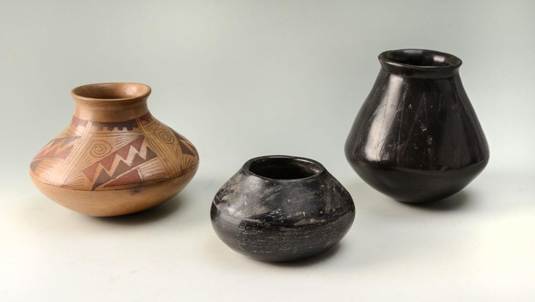 3 PIECES OF SAN ILDEFONSO AND ACOMA POTTERY: 3 PIECES OF SAN ILDEFONSO AND ACOMA POTTERY: An assembled collection of 3 pieces total to include 1) Isabel Pena black on black bowl, 3 1/4'' h. x 5 1/2''. 2) Black on black jar signed Cruz Soto, 6 1/