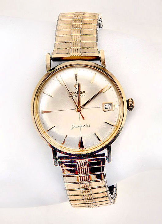 GENTS OMEGA SEAMASTER BRACELET WATCH: GENTS OMEGA SEAMASTER BRACELET WATCH: OMEGA - a gentleman's Seamaster bracelet watch. Gold plated case with stainless steel case back. Reference 18842085. Champagne dial with baton hour markers, day a