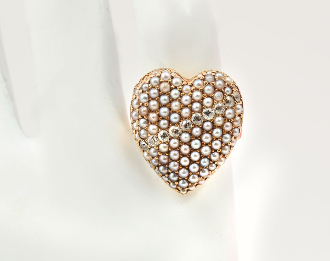 14K PEARL & DIAMOND HEART RING: 14K PEARL & DIAMOND HEART RING: 14K yellow gold pearl and .33 CTW diamond locket heart ring. Size: 3.5