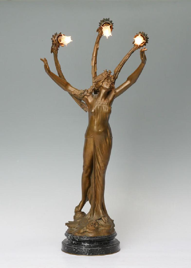 GEORGE FLAMAND NOUVEAU FIGURAL BRONZE LAMP: GEORGE FLAMAND NOUVEAU FIGURAL BRONZE LAMP: Nouveau Maiden, Bronze 3 light lamp, 32" h. overall, affixed to marble plinth, signed on bronze base.